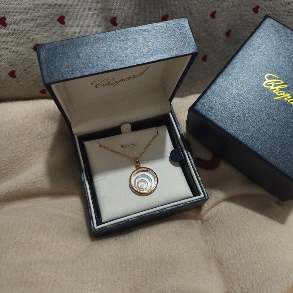 Chopard Rose Gold Pendant Necklace with Floating Diamond Accent